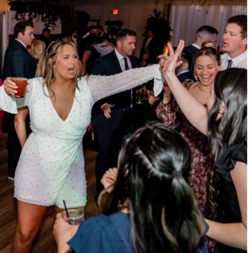 Girls singing at a wedding